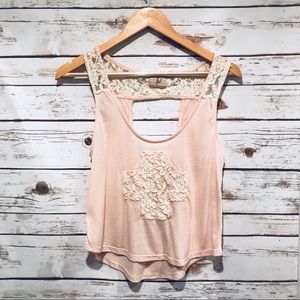 Pale pink top with lifeguard cross in lace